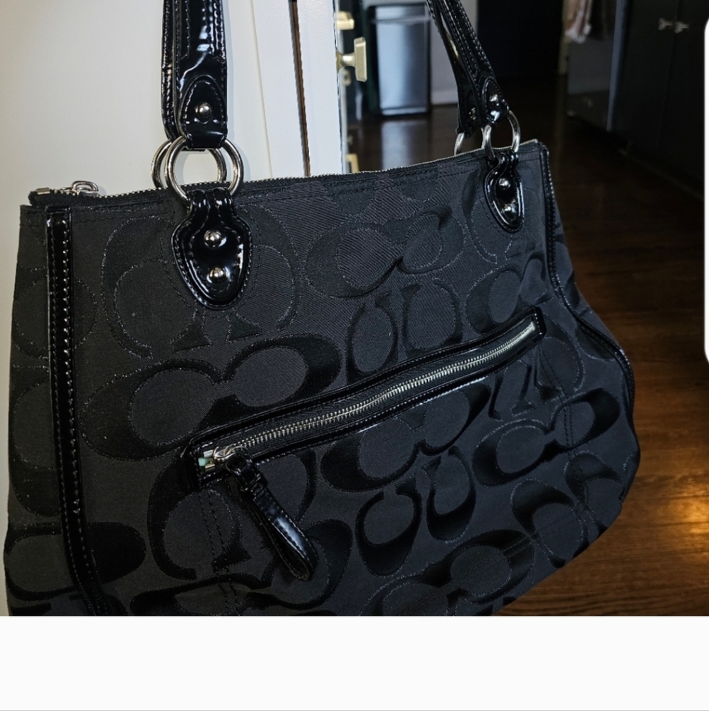 Coach tote purse black with turquoise blue lining